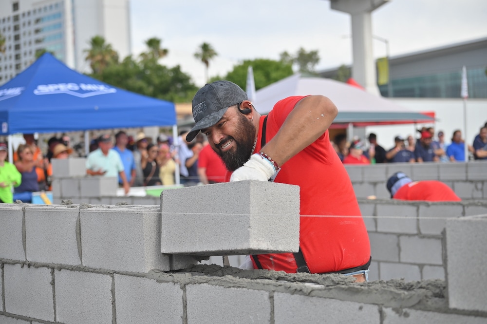Man working with cement blocks 