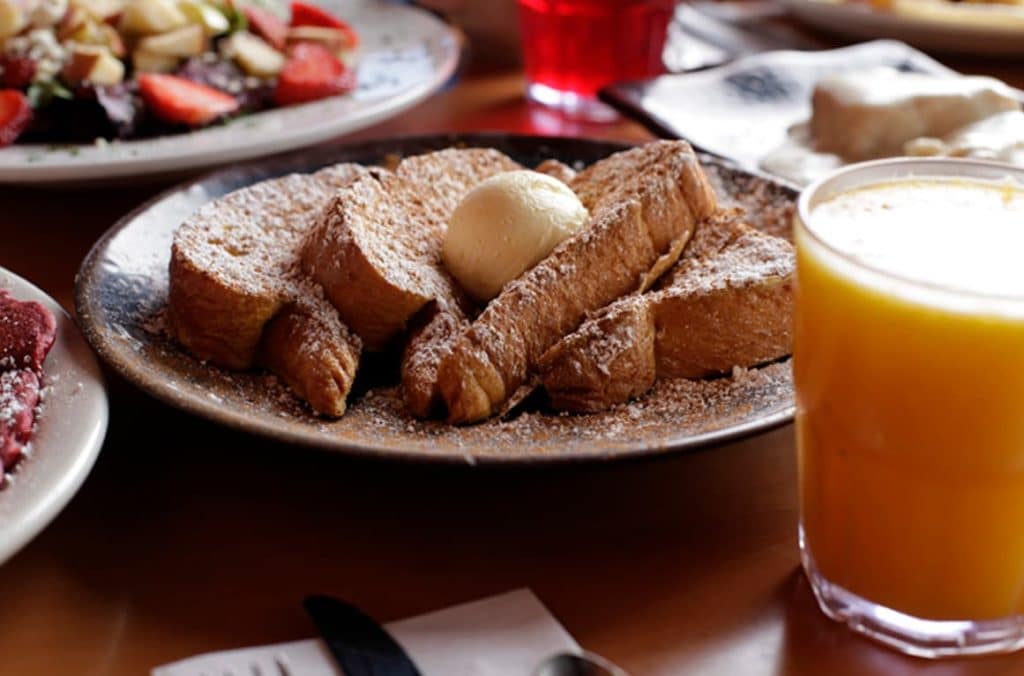 French Toast with butter and orange juice