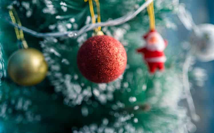 Red Christmas ornament on Christmas tree