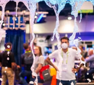 an unfocused picture of attendants to the International Carwash Association (ICA) The Carwash Show. The main focus is on the soap bubbles that cover the photo.