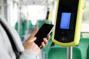 Focus Is On A Person Using Their Cellphone To Order Mobile Tickets
