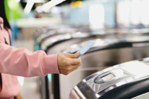 Focus Is On A Woman Scanning A Ticket