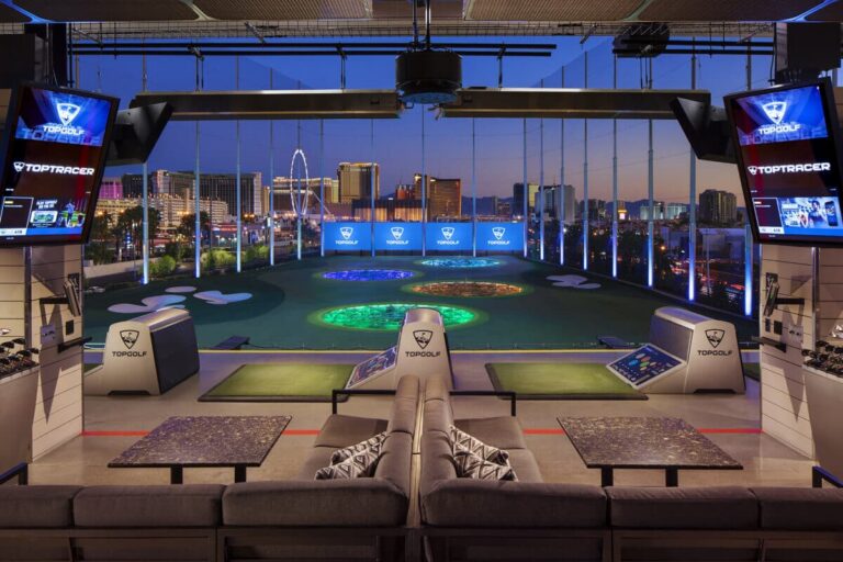 Topgolf Las Vegas outdoor golf entertainment venue featuring neon targets and city views.