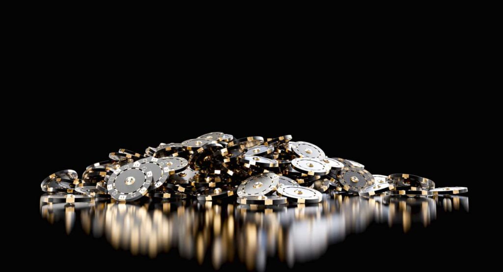 Pile of gleaming gold WSOP champion bracelets, the coveted prize awarded to winners at the Las Vegas World Series of Poker.