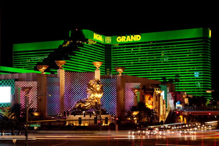 A photo of MGM Grand at night lit up in green.