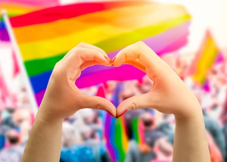 Two hands creating heart shape for pride weekend in las vegas